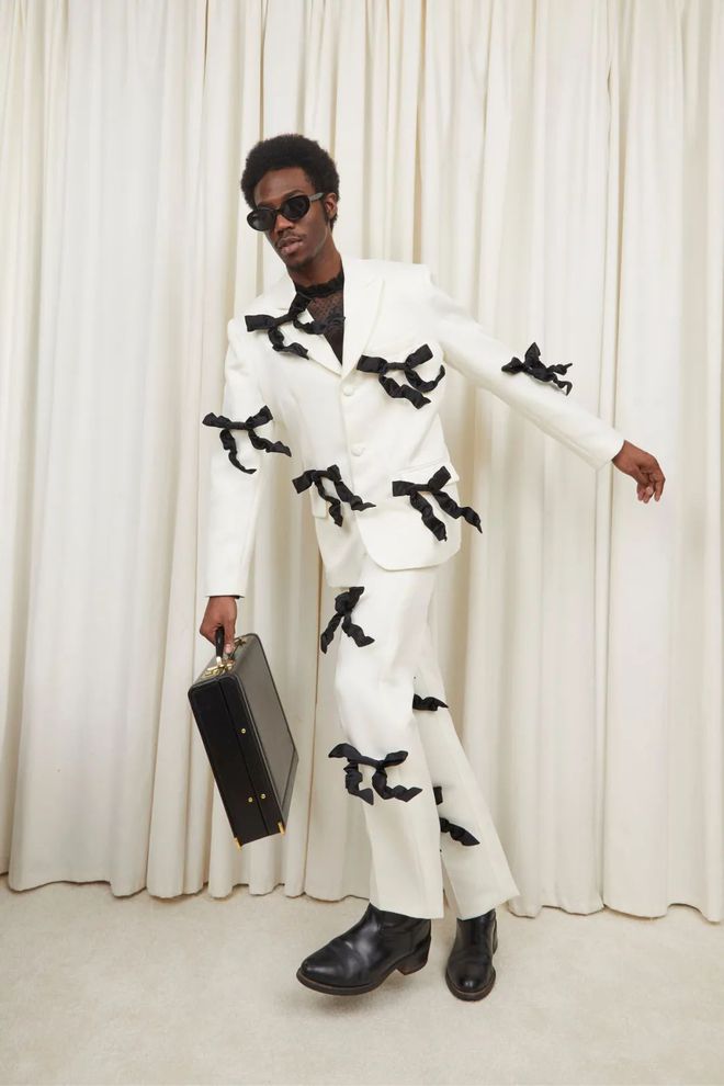 九游体育：TannerFletcher2024秋冬系列格纹图案的直线线条(图37)